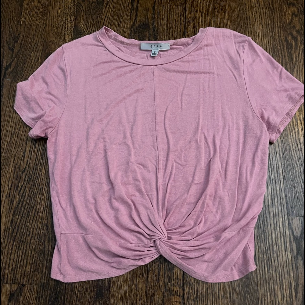 pink shirt with tie in front
